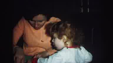 Lynbrook New York (1976): A Mother Is Opening The Gift And The Children Were