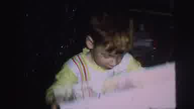 Lynbrook New York-1976: Young Boy Opening Gift With Woman In Home Movie