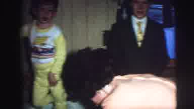 Lynbrook New York (1976): Older Brother Wears A Suit And Tie While Brothers Are