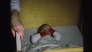 Lynbrook New York (1976): One Child Is Lying In Bed And The Other Is Knocking The