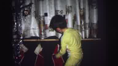 Lynbrook New York (1976): Three Children Gather Their Christmas Stockings As