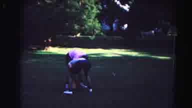Hagerstown Maryland Usaa-1963: Two People Playing With Something In The Yard