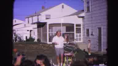 Hagerstown Maryland Usaa (1963): Man Wearing White Shirt Picks Up And Carries
