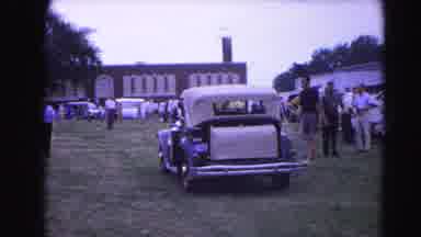 Hagerstown Maryland Usaa (1963): A Vintage Car Drives To A Large Outdoor Picnic In