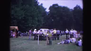 Hagerstown Maryland Usaa (1963): Group Of Men At A Car Show Inspect An Old Yellow