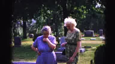 HAGERSTOWN MARYLAND USAA-1963: Elder Women And Men Look At Headstones In The Cemetery