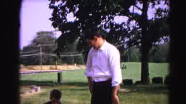 Hagerstown Maryland Usaa (1963): Adult Holding Bucket Watches Youth Place Plant In
