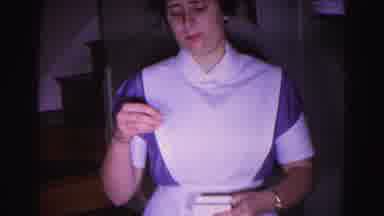 Hagerstown Maryland Usaa (1963): A Nurse In A Hat And Apron Stands Beside A