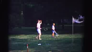 Hagerstown Maryland Usaa (1963): People Playing Badminton In Grass On A Clear