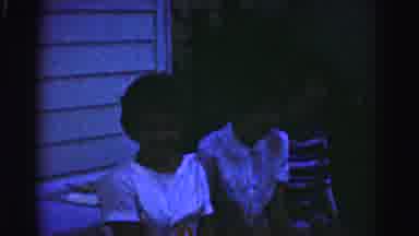 Hagerstown Maryland Usaa (1963): Two People Sit On Bench And Something Falls From