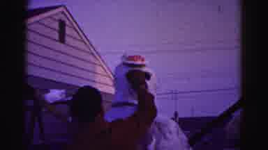 Hagerstown Maryland Usaa (1963): Woman Wearing Blue Dress Stands Under White