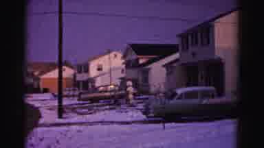 Hagerstown Maryland Usaa (1963): Suburb Snowfall With Child Making Snowman Outside
