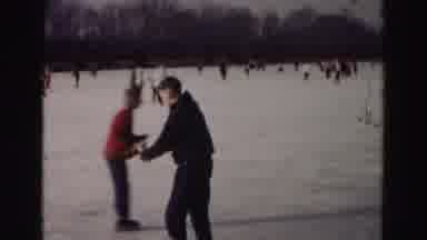 Hagerstown Maryland Usaa (1963): A Man Holding Gloves Is Skating Among A Group Of