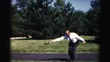 Hagerstown Maryland Usaa (1963): Men In Dress Clothes Hit A Ball Back And Forth