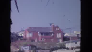 Tijuana Mexico (1962): Older Buildings In A Semi-Tropical Area Panning To Red