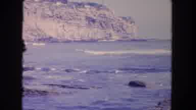 Tijuana Mexico (1962): Rolling Waves Crashing Into A Rocky Beach Surrounded By