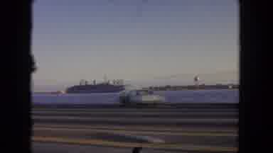 Tijuana Mexico (1962): Passing View Of Island And Water Tower On A Sunny Day