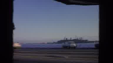 Tijuana Mexico (1962): Driving Along Waterway While Viewing A Ship In The Water