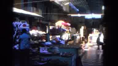 Tijuana Mexico (1962): The Inside Of A Fully Stocked Store With A Person Sitting