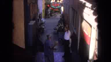 Tijuana Mexico (1962): Three Persons Are Walking In The Middle Street