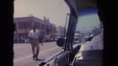 Tijuana Mexico (1962): As A Vehicle Drives Down The Road People Go About Their Day