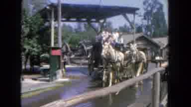 San Diego California (1962): A Group Of People Riding On A Stagecoach Pulled By