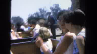 San Diego California (1962): Family Enjoys An Amusement Park Ride That Looks