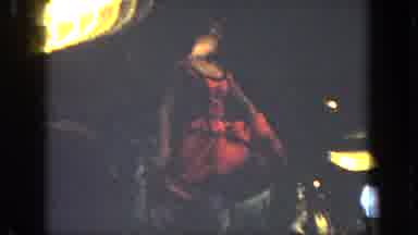 San Diego California (1962): Woman Wearing Red Dress Dances On Stage While People