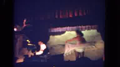 San Diego California (1962): Woman In Dress Dances By Spinning Around While