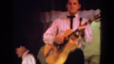 San Diego California (1962): Men And Woman Dressed Up Perform Music And Dance On