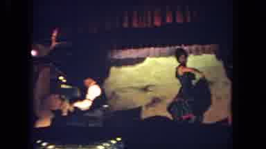 San Diego California (1962): Man And Woman Dressed Up Perform Music And Dance On