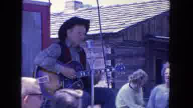 SAN DIEGO CALIFORNIA-1962: Man Playing Guitar And Singing Country Music