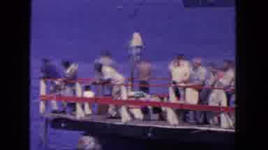 San Diego California (1962): Men In White Clothing Fish On A Dock Together During