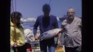 San Diego California (1962): Three Friends Reveling In The Catch Of The Day Off A
