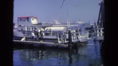San Diego California (1962): People Getting Off A Passenger Boat At A Harbor