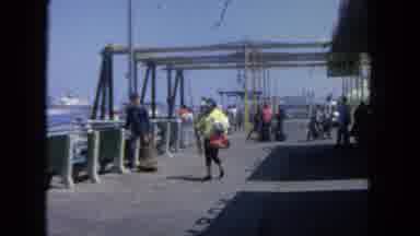 San Diego California (1962): People Getting Ready To Go On Vacation To Take A