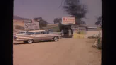 San Diego California (1962): There Is A Roadside Vendor Selling Strawberries Corn