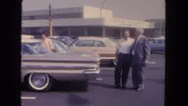 San Diego California (1962): A Man Taking To A Sales Person About Possibly Buying