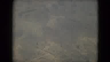 Mexico City Mexico (1962): Grainy Footage Overhead Flying Desert Sands Windy Dust