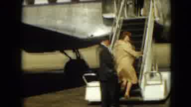Mexico City Mexico (1962): Man And Woman Board A Large Passenger Plane By Walking