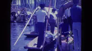 Mexico City (1962): Video Clip Of People Riding On Boats As Men Stand Up Rowing