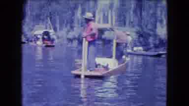 Mexico City (1962): Filming Crew On One Boat Takes Pictures Of Man Rowing Another