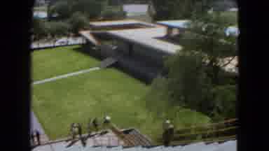 Mexico City (1962): Buildings With Pathways Connecting Them And People Standing