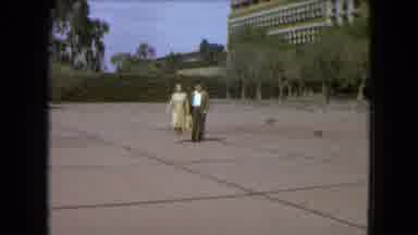Mexico City (1962): A Couple Is Walking Through The The Vast Esplanade Near To A