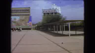Mexico City (1962): Pan Of A Buildings A Breezeway People Standing And Bright