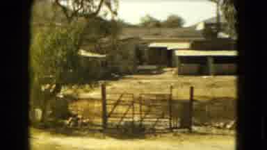 Mexico City (1962): Driving By The Scenery Of Old Buildings In The Desert That