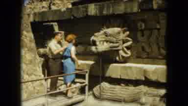 Mexico City (1962): Man And Woman Visiting A Ancient Ruin With Dragon Head