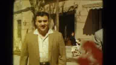 Mexico City (1962): Man Inspects Classic Cars Parked At Car Show In Downtown