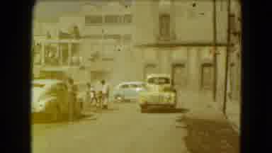 Mexico City (1962): Antique Cars Drive On The Streets By Abandoned Looking