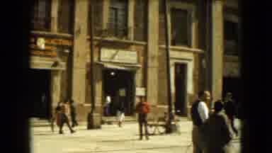 Mexico City (1962): Men And Women Walking Around In An Old Time Factory Setting